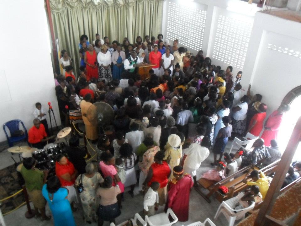 Large congregation gathered together representing community togetherness